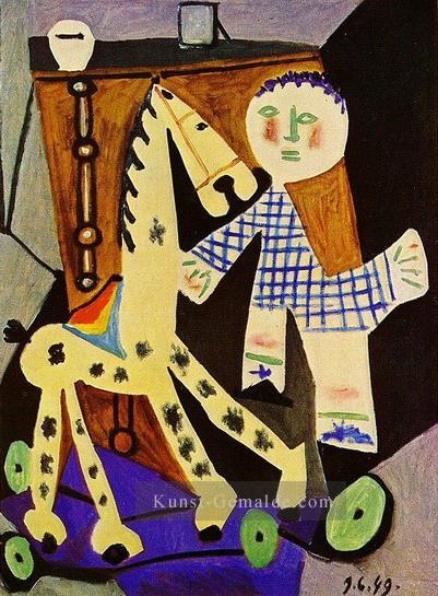 Claude a deux ans avec son cheval ein roulettes 1949 Kubismus Ölgemälde